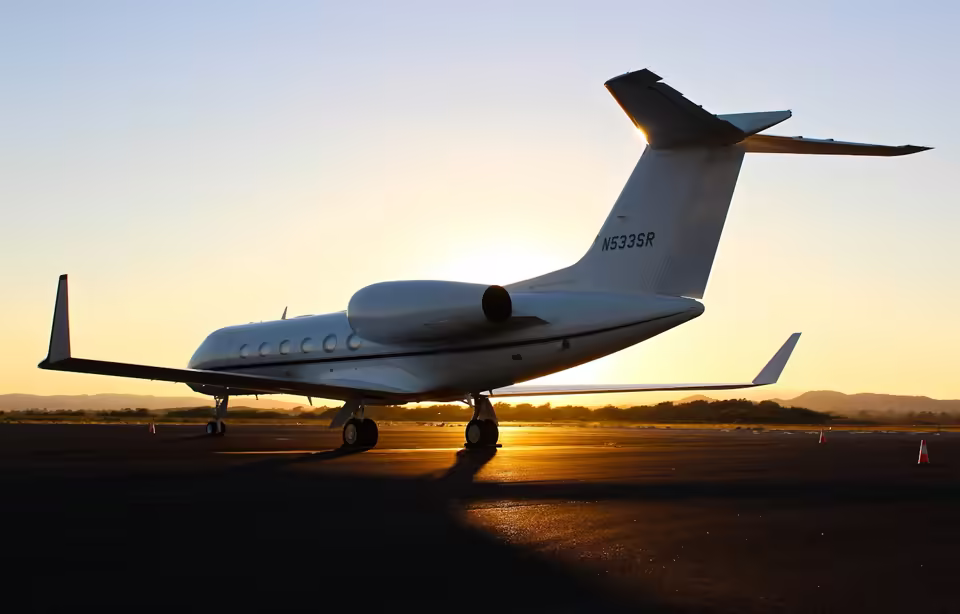 Commercial aircraft parked at an airport terminal during active operations