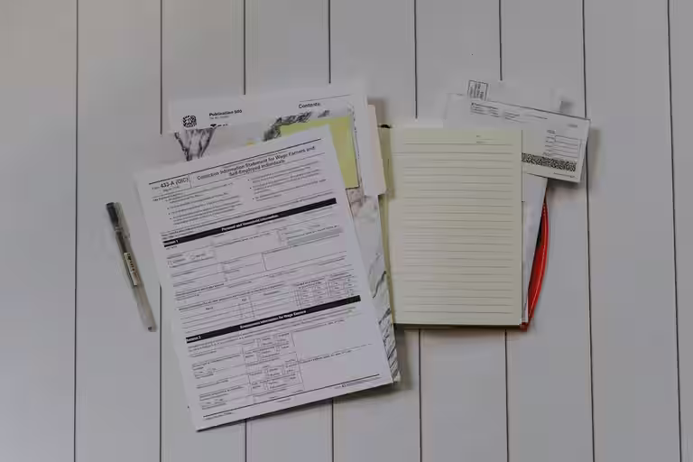 Accountants and CPA professionals reviewing financial records in a modern office