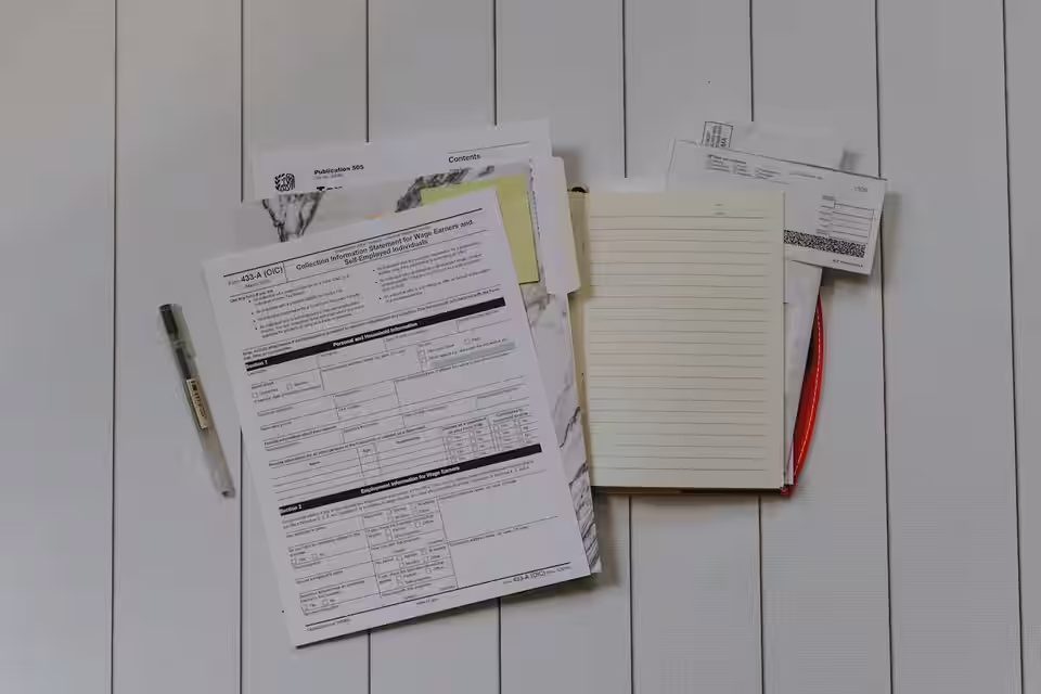 Accounting professionals reviewing tax records and transaction data
