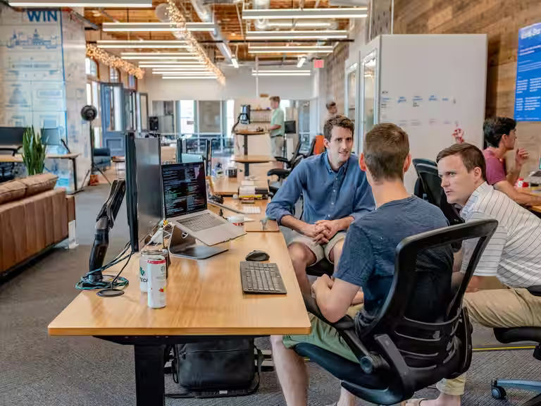 HR professionals collaborating in a modern corporate office
